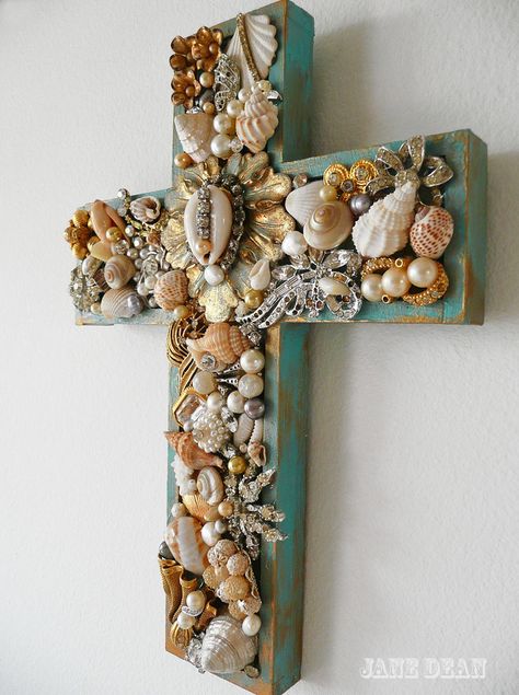 https://flic.kr/p/8sviNr | Shell cross hanging | Handpainted wooden cross collaged with genuine seashells and pearls, vintage jewelry parts and beads. Wooden Cross Crafts, Ocean Room Decor, Seashell Cross, Shell Cross, Wood Wall Cross, Seashell Projects, Christian Crafts, Cross Crafts, Shell Crafts Diy