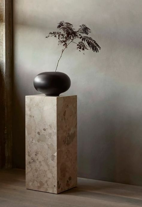 Marble plinth with minimalist round vase and foraged branch | Menu launches a new collection of decorative objects by Colin King | These Four Walls blog Minimalist Flower Arrangement, Tactile Design, Colin King, Nero Marquina Marble, Lampe Decoration, Minimalist Flowers, Alvar Aalto, House Doctor, Bench Table