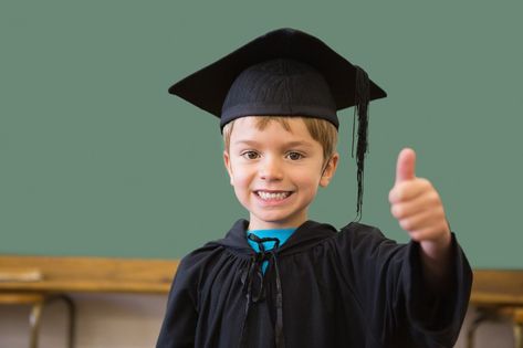 Cute pupil in graduation robe smiling at camera in classroom at the elementary school Graduation Elementary School, Church Poster Design, Church Poster, Elementary School, Primary School, Elementary Schools, Poster Design, Ice Cream, Cream