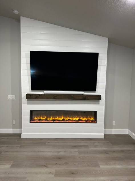 Electric Fireplace And Mantle Ideas, Diy Electric Fireplace Wall Vaulted Ceiling, Diy Electric Fireplace Wall Slanted Ceiling, Electric Fireplace Ideas With Tv Angled Ceiling, Electric Fireplace Ideas With Tv Half Wall, White Shiplap Electric Fireplace Wall, Floor To Ceiling Electric Fireplace, Slanted Wall Fireplace, Electric Fireplace With Vaulted Ceiling