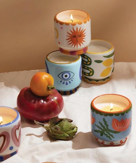 A DOPO SCENTED CANDLE Inspired by the colors and patterns of Morocco, the A Dopo candle collection features ceramic footed pots with hand-painted details and hand drawn dust covers APPROXIMATELY 48 HOURS OF CLEAN BURN TIME Artisan ceramic vessel is poured in the USA with 8-ounces of our soy wax blend free of formaldehyde, phthalates, and animal-sourced ingredients; burn times may vary due to environment; for best results, place candle away from drafts, always trim wicks, and let the wax pool ful Clay Candle Pots, Diy Ceramic Painting, Candles Pottery, Ceramic Candles, Candle Ceramic, Candle Painting, Cactus Ceramic, Painted Pot, Candle Pot