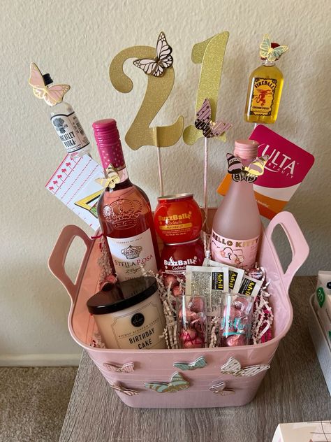 21st Birthday Gift Baskets: 25+ Unique & Thoughtful Ideas. Check it out! 18th Gift Basket, Best Friend Gift Basket Ideas Birthdays, Birthday Basket For Grandma, 21 Birthday Gift Basket, 21st Gift Basket Ideas, Gift Basket For Sister Birthday, 30th Gift Basket For Her, Diy 21st Birthday Gifts For Her Baskets, Dollar Tree Gifts For Women