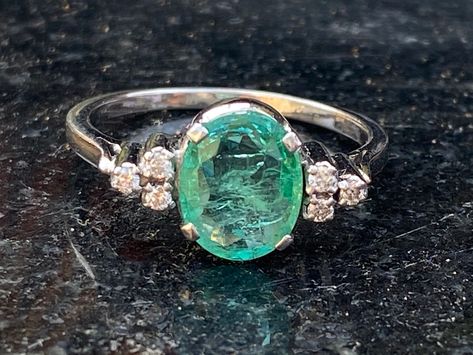 EMERALD DIMAOND ENAGAGEMENT Ring - May Birthstone - Zambian Emerald Gold Ring - Statement Ring - Green beryl Engagement Ring. ✦Gemstone: Natural Emerald *natural inclusions  ✦Stone Cut: oval Cabochon ✦Stone Size: 2.45 CT WT oval cut  and around 1.8mm round diamonds ✦Metal: 925 sterling silver Available in all natural color stones on order. *Because we use natural stones, the stones may vary slightly in shape, size and color. Don't see your gemstone in the options ?feel free to contact me  100% handmade more quantity available on demand. We accept Custom Order. If you have any questions about this piece or if we can help you with any of our other products please feel free to contact us I am more than happy to make customs orders or price for wholesale orders  please message me and i will po Beryl Engagement Ring, Emerald Gold Ring, Traditional Engagement, Smaragd Ring, Raw Emerald, Traditional Engagement Rings, Emerald Diamond Ring, Color Stones, Zambian Emerald