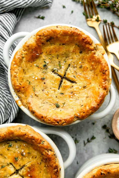 A classic comfort food recipe, made mini: Individual Chicken Pot Pie with tender chicken, hearty vegetables, & flaky herbed butter crust. Pot Pie Crust, Dinner Pie, Homemade Pot Pie, Individual Chicken Pot Pies, Herbed Butter, Mini Pot Pies, Chicken Pot Pie Filling, Mini Chicken Pot Pies, Pot Pie Filling