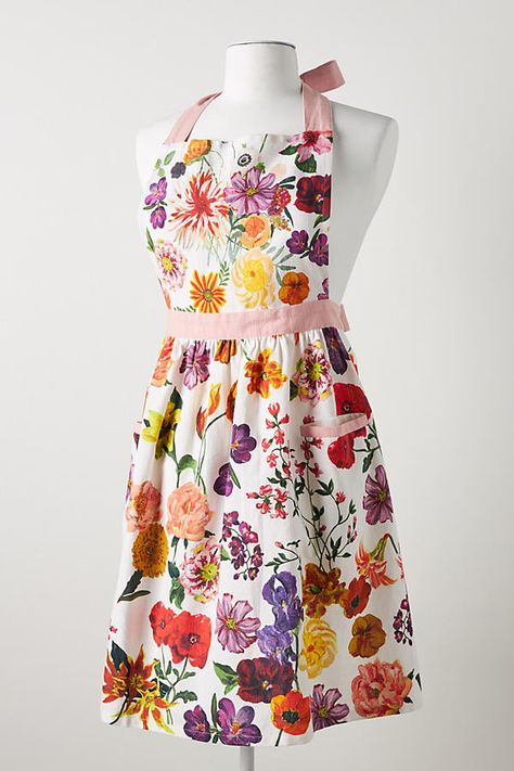 Featuring a blooming field of flowers, this apron was designed by Nathalie Lete in collaboration with Anthropologie. About Nathalie Lete Once a member of Mathias et Nathalie, a duo renowned for their cardboard paintings and expressionist sculptures, French art and designer Nathalie Lete now works as a solo artist, creating paintings, ceramics, textiles, jewelry, books and toys centered on themes of fantasy, humor and childhood memories. Parisian Studio, Nathalie Lete, Cardboard Painting, Elie Saab Spring, Field Of Flowers, Cute Aprons, Sewing Aprons, Aprons Patterns, Apron Designs