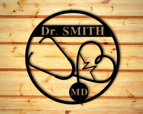 "Beautiful Personalized Metal Sign for Medical Field Loved Ones! Customize your sign with a name and title for RN's, LPN's, MD's, CNA's, and more! Our metal signs are cut with top of the line laser technology to ensure precise design! We powder coat each sign for protection and a smooth finish! We offer multiple color options:) This sign comes with two screw holes for those wanting to anchor it to the wall or with our 18\" Gauge steel you can easily hang your sign by using wall magnets for flat Doctor Sign Medical, Nurse Door Sign, Doctor Sign, Nurse Door Hangers, School Clinic, Laser Creations, Nurse Decor, Gift For Doctor, Dental Gifts