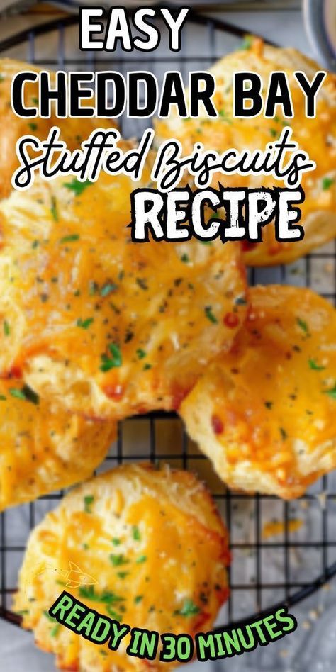 Easy Cheddar Bay Stuffed Biscuits. These golden pillows of buttery goodness are stuffed with a savory cheddar bay filling that will have you reaching for seconds (and thirds!). Perfect for brunch, as a side dish, or as a snack, these biscuits are sure to become Cheddar Bay Biscuits Pizza, Recipes Using Cheddar Bay Biscuits, Cheddar Bay Biscuit Recipe Ideas, Cheddar Bay Biscuit Casserole, Stuffed Biscuits, Biscuits Casserole, Cheddar Bay Biscuits, Brunch Spread, Flaky Biscuits