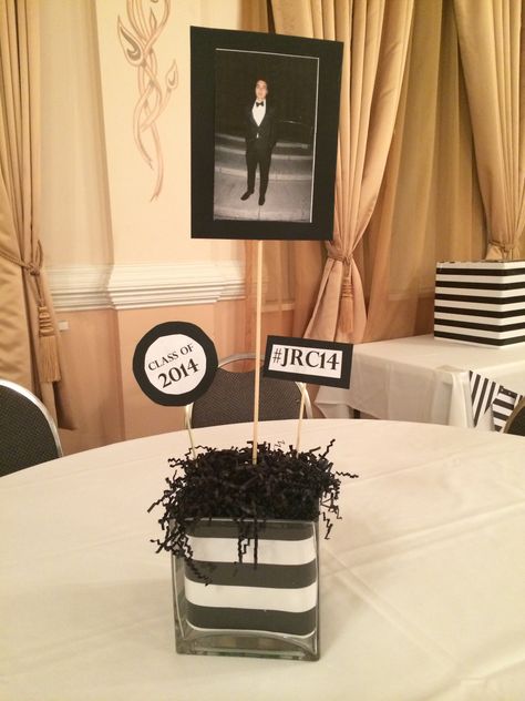 DIY centerpieces for black and white party for graduation Guy Graduation Centerpieces, Black And White Centerpieces Diy, Male Graduation Centerpiece Ideas, Table Centerpieces For Party Birthday Easy Diy Center Pieces, Black And White Centerpieces For Party, Black And White Graduation Party, Centerpieces Graduation, Black And White Centerpieces, Black And White Party