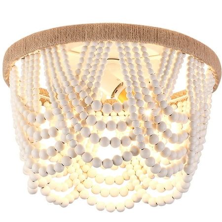 Capslpad boho beaded light fixture is made of warm white wood bead and sturdy rope,is a perfect blend of traditional crafts and art.The boho chandelier will give off a beautiful flow and shadow on the ceiling-Delicate & Special. Great addition for bedroom,living room,kitchen,dining room,hallway,entryway,nursery,girl room,kids room. Size: 12.8"(D) x 9.6" (H). Doily Light Fixture, Boho Nursery Chandelier, She Shed Chandelier, Boho Bedroom Chandelier, Nursery Chandelier Girl, Boho Kitchen Light Fixtures, Girls Room Light Fixture, Alternative Chandelier, Girls Bedroom Light Fixture