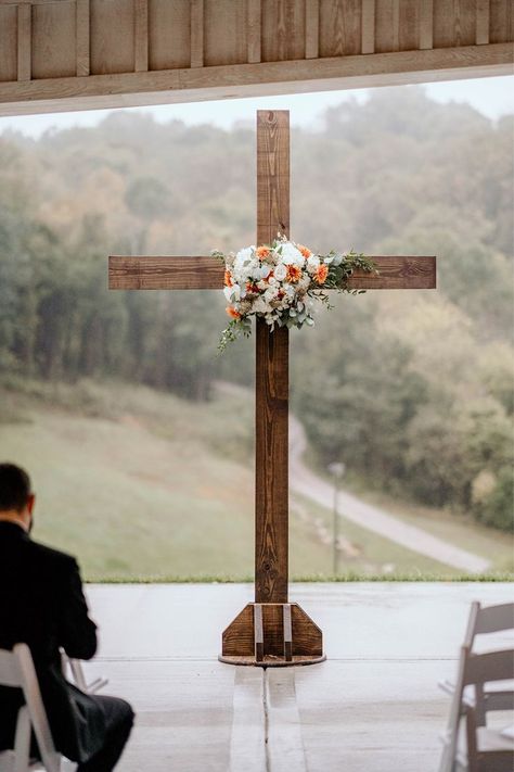 This wooden cross with hanging florals is beautiful for a wedding altar. I love how the orange and white florals pop against the dark wood of the cross. To see more photos from this fall wedding check out our gallery! Wooden Cross Wedding, Family Christmas Crafts, Wooden Crosses Diy, Wood Crosses Diy, Hanging Florals, San Clemente Wedding, Cross Wedding, Wedding Altar, Columbia Tn