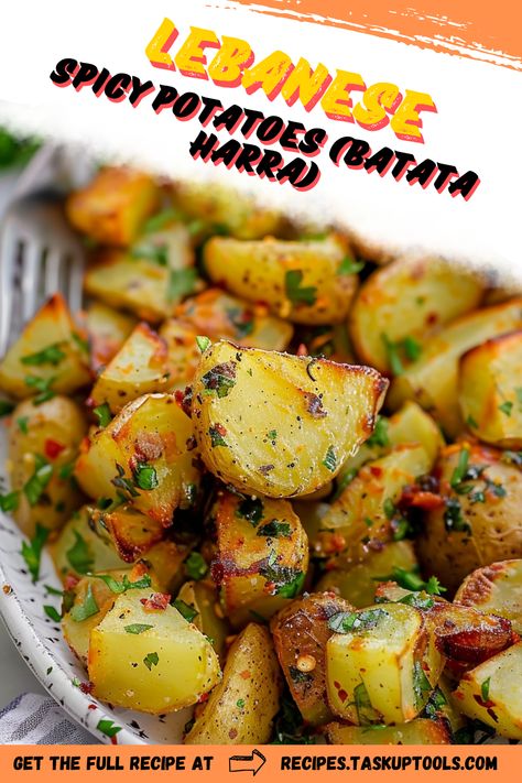 Discover the vibrant flavors of Lebanese Spicy Potatoes (Batata Harra) with this delightful recipe that brings together crispy diced potatoes, aromatic spices, and fresh herbs. Perfect as a side dish or a standalone snack, these potatoes are tossed in a zesty mix of garlic, coriander, and chili for a delicious kick. Explore the rich culinary traditions of Lebanon and impress your guests with this irresistible dish thats easy to prepare and bursting with flavor. Pin this recipe to elevate your next meal and savor Lebanese Spicy Potatoes, Crispy Diced Potatoes, Lebanese Potatoes, Batata Harra, Cilantro Garlic Sauce, Spicy Potatoes, Pakistani Dishes, Cilantro Sauce, Diced Potatoes