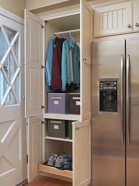 Handy "closet" cabinet near the back door leading into a kitchen with no mud room.  Brilliant! Backdoor Entry Into Kitchen, Entry Into Kitchen, Kitch Cabinet, Mudroom Nook, Backdoor Entry, Coat Cabinet, Custom Closet Cabinets, Custom Cabinets Kitchen, Kitchen Mudroom