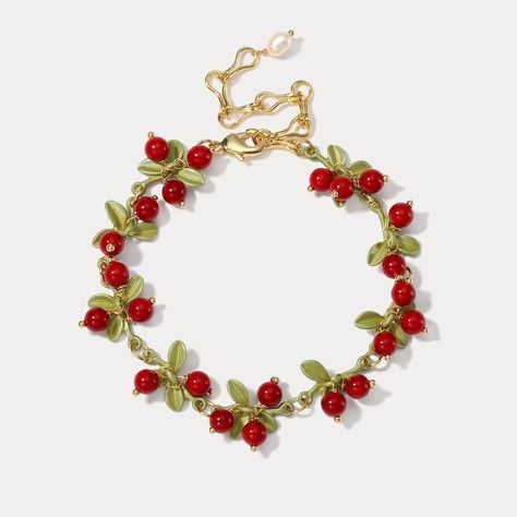 This Cranberry Bracelet is sure to make a statement. Crafted from lustrous alloy, this piece is the perfect touch of sophisticated glamour. Its bold cranberry hues will add a splash of vibrancy to your look and will surely be admired.>> See More Orchard Jewelry Collection. DETAILS Plating: 18K Gold Materials: 18K Fruit Bracelet, Star And Moon Necklace, Rabbit Necklaces, Orange Bracelet, Fruit Jewelry, Cuban Link Chain Necklaces, Prom Jewelry, Classy Jewelry, Funky Jewelry