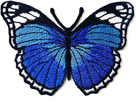 Amazon.com: Tyga_Thai Brand Butterfly Blue Color Retro Beautiful Logo Iron on sew on Patch Jacket T Shirt Patch Sew Iron on Embroidered (Iron-Butterfly-Blue): Arts, Crafts & Sewing 3d Butterfly Embroidery, Embroidered Butterfly Simple, Blue Butterfly Embroidery Pattern, Blue Butterfly Sticker, Butterfly Navy Blue Pillow, Bag Badges, Birthday Fits, Beautiful Logos, Patches Jacket