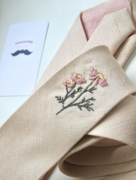 Champagne Textured Satin Floral Embroidered Necktie Details: Each necktie is handmade with the idea of artfulness and tailoring in mind.  With an ever-rotating selection of limited fabrics, pieces don't last long so if you fall in love with one, be sure not to let it get away <3 OTHER FLORAL OPTION AVAILABLE Add the matching pocket square here : https://handsomeandlace.etsy.com/listing/1752766825 This particular neck tie was hand stitched from a quality champagne textured reverse satin with the Embroidery For Wedding, Embroidered Handkerchief Wedding, Embroidered Tie, Wedding Handkerchief, Wedding Day Inspiration, Embroidered Wedding, Pocket Square, Dusty Pink, Hand Stitched