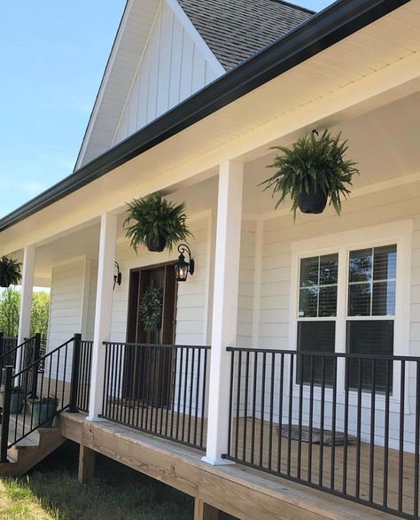 Metal Porch Railing Ideas Farmhouse, Front Porch With Railing Ideas, Front Porch With Metal Railing, High Front Porch Ideas, Front Porch Black Railing, Closed Porch Ideas, Fenced In Porch, Porch Fence Ideas, Black Porch Railing Ideas