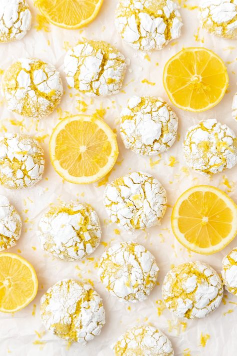 These lemon crinkle cookies are a fun twist on classic chocolate crinkles! With crispy edges and soft lemony centers, they're an easy, fun summer cookie that everyone will love! Lemon Crinkle Cookies Recipe, Snowball Cookie, Summer Corn Chowder, Pink Sangria, Christmas Baking Gifts, Summer Cookie, Berry Sangria, Lemon Crinkle Cookies, Citrus Recipes