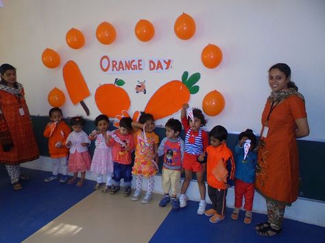 OISS - Orange Day Pre Nursery On Thursday 22nd January  2015, Orange colour day was celebrated for Pre Nursery. Classroom was decorated with orange balloons & objects related to orange colour was displayed.This activity helped children to recognise the orange colour & its different shades. Teachers helped children to do thumb printing with orange paint on the template of a carrot. At the end of the day they could recognise orange colour. Orange Colour Day Decoration In School, Orange Colour Day Activities For Kids, Orange Day Activity For Kids, Orange Day Decoration Ideas Preschool, Orange Day Celebration In Preschool, Orange Colour Day, Orange Activities, Orange Paper Craft, Activity Based Learning