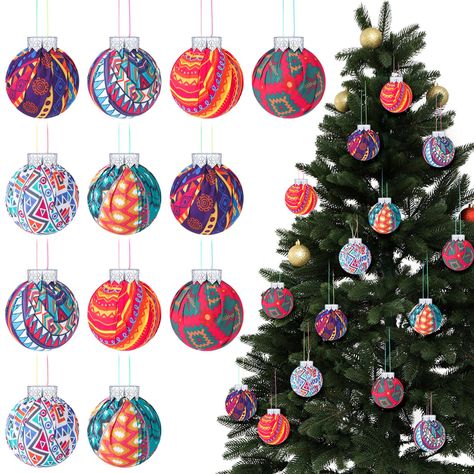 PRICES MAY VARY. Festive Christmas Ornaments: you will receive12 Mexican style Christmas tree balls; The ornaments, complete with detailed patterns and vibrant colors, bring the quintessential joy and warmth of the holiday season to your home decor Quality Fabric Construction: these Mexican style Christmas ornaments are carved out of fabric, making them not just aesthetically appealing but also highly durable; They are specifically designed to be lightweight and resistant to fading; These fabric Joy To The World Christmas Decoration, Mexican Theme Christmas Tree, African Christmas Tree, Mexican Christmas Tree, Mexican Ornaments, Mexican Christmas Decorations, African Christmas, Colorful Decorations, Christmas Tree Balls