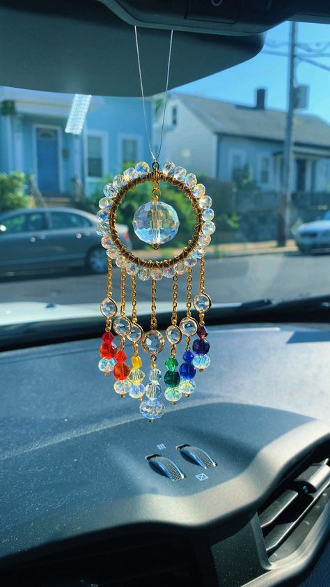 Decorate your space with this beautiful bright Rainbow Crystal  car charm sun catcher with beautiful crystal beads, and a crystal prism that reflects rainbows in direct sunlight. 🌞🌈 ✨Handmade with love! Add some positive energy to your car's rear view mirror or any small space like your kitchen or bathroom window. Perfect for tiny homes and van lifers too! Makes the perfect gift for anyone and everyone who loves all things that sparkle and shine!  ✨thank you for supporting my small business! I Crystal Car Hanging, Van Lifers, Crystal Suncatchers Diy, Crystal Car Charms, Rainbow Car, Seed Bead Bracelets Tutorials, Suncatcher Diy, Car Charms Rear View Mirror, Diy Suncatchers