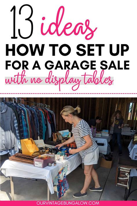 woman organizes items on tables for a garage sale text reads - 13 ideas how to set up for a garage sale with no display tables Simple Garage Sale Ideas, Yard Sale Shoe Display, Diy Garage Sale Clothes Rack, Garage Sale Clothes Display, How To Hang Clothes At A Yard Sale, Yard Sale Set Up Ideas, Garage Sale Set Up Ideas, Yard Sale Organization Display, Garage Sale Ideas