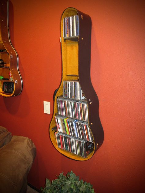 "Taste of Honey" This Guitar Case shelf is the Perfect Christmas Gift!!! To purchase one of my Guitar Case Shelves shown above, please visit my Etsy store at jimbosguitarshelves or my website at www.jimbosguitarshelves.weebly.com Thanks! Guitar Shelf, Music Furniture, Old Guitar, Home Music Rooms, Guitar Room, Guitar Ideas, Music Room Decor, Hemma Diy, Music Decor