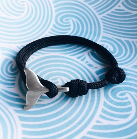 - WHALE TAIL BRACELET WITH INITIALS- My wonderful whale tail bracelet is perfect gift for the marine-life enthusiasts out there! The fastening is created using the natural shape of the whales tail combined with a durable paracord rope.  A great gift for anyone who's a fan of these gentle giants! - WHY A WHALE? - - Whale symbolism includes wisdom, spiritual awareness and good luck. - YOU WILL RECEIVE - - A paracord bracelet with a strong and durable tail fastening made from stainless steel.  - Wi Whale Symbolism, Whale Accessories, Whale Bracelet, Bracelet With Initials, Whales Tail, Paracord Rope, Lover Bracelet, Whale Gift, Lovers Bracelet