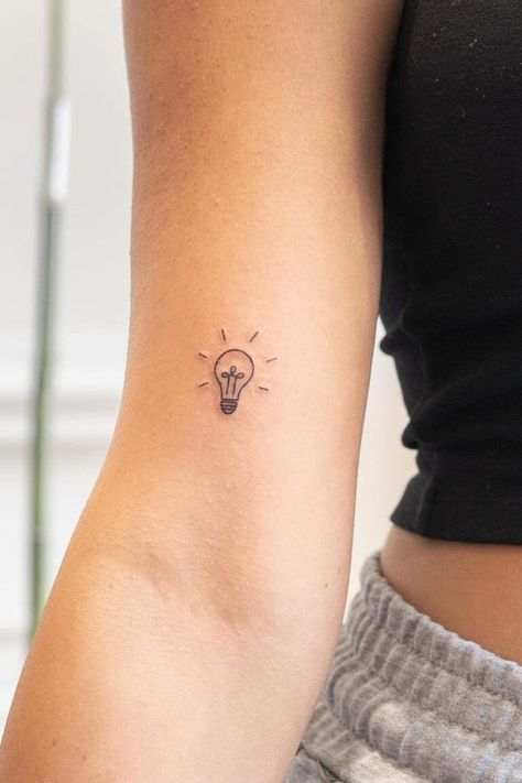 27 Unique Tiny Tattoos (Ideas, Designs & Meanings) #tattoo #art #outline #template #portfolio #idea #neck #minimalist #inspiration Tattoo Ideas Teacher, Small Teacher Tattoos, Light Tattoos For Women, Therapy Tattoo Ideas, Teacher Tattoo Ideas Simple, Photography Tattoo Ideas, Therapy Tattoo, Teacher Tattoo, Tiny Tattoos Ideas