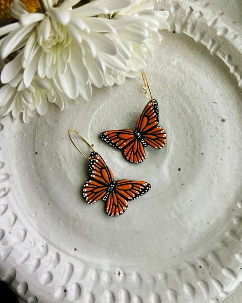 So many people have asked about these!!!! 🦋 I’ve decided to add them to the shop. Please note that they are made to order and take TIME. But happy to announce you can now have your own monarch hoops! You can shop on both the website (under picnic launch) and Etsy (under bestsellers)!! 🧡🧡🧡 • • • • • • • • • • #smallbiz #smallbizowner #smallbusiness #smallbusinessowner #earrings #handmadeearrings #handmadejewelry #polymerclay #polymerclayartist #polymerclayjewelry #polymerclayearrings #clay... Monarch Earrings, Butterfly Monarch, So Many People, Monarch Butterfly, Jewelry Earrings Hoops, Take Time, Polymer Clay Jewelry, Clay Jewelry, Polymer Clay Earrings