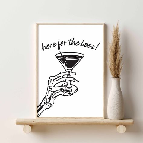 "DIGITAL DOWNLOAD.  Here for the Boos Halloween Decor, Skeleton Hand Cocktail Print, Halloween Bar Art, Halloween Party Decor, Halloween Wall Art *To view this item as a printed and shipped poster, please see this listing: https://www.etsy.com/listing/1539449615/ *To view this item as a gallery wall set, please see this listing: https://www.etsy.com/listing/1525518948/ Instant downloadable artwork is an easy project and great last minute gift.  You can spend a little, make as many prints as you Halloween Decor For Bar Area, Fall Bar Decor, Halloween Wall Art Diy, Boo Signs For Halloween, Spooky Snoopy, Halloween Bar Decor, Apartment Halloween Decor, Halloween Mural, Skeleton Artwork