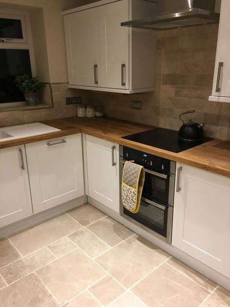 Country kitchen, oak worktops, natural stone, white and grey, stonefield kitchen, kitchen diner Cream Kitchen Flooring Ideas, Brown Worktop Kitchen, Cream Oak Kitchen, Cream Kitchen Oak Worktop, B&q Kitchen, Oak Kitchen Worktop, White Kitchen Oak Worktop, Oak Worktop Kitchen, Cream And Oak Kitchen