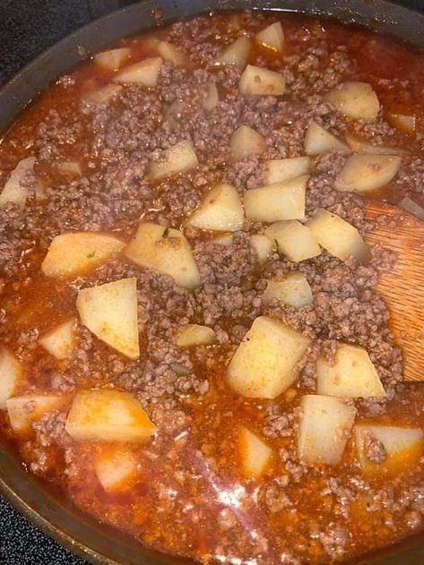 A skillet filled with Mom's Picadillo Con Papa - ground beef and potatoes cooked with tomato sauce and spices Picadillo Con Papas Recipe, Papas Recipe, Mexican Picadillo, Meat And Potatoes Recipes, Hamburger And Potatoes, Ground Chuck, Picadillo Recipe, Papa Recipe, Ground Beef And Potatoes