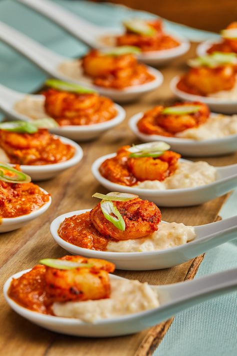 Southern event appetizer idea- shrimp and grit spoons! Plate up grits and seasoned shrimp for a taste of southern charm https://lovelessevents.com/ Catering: Loveless Events Soulfood Appetizers Wedding, Shrimp And Grits Bites, Creole Wedding Food, Soulfood Appetizers, Soul Food Appetizers, Grits Appetizer, Shrimp Cocktail Shooters, Event Catering Ideas, Southern Wedding Food