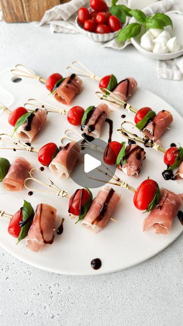 Kristel Talie on Instagram: "Prosciutto Wrapped Skewers✨  I love how easily these Prosciutto-Wrapped Mozzarella Skewers can glam up your snack table!🍅🧀✨ Perfect for impressing your guests or a tasty treat just for you🤩  You’ll need  Prosciutto Mini mozzarella balls Fresh basil Cherry tomatoes Salt Balsamic glaze  1- Using a sharp knife, cut each prosciutto slice in half. 2- Place a mozzarella ball on each prosciutto and roll. 3- On a cocktail skewer, place one cherry tomato, followed by a basil leaf and the rolled mozzarella prosciutto. 4- Place on a serving dish and sprinkle some salt and serve with a drizzle of balsamic glaze. Enjoy!✨  #partyfood #prosciutto #caprese #appetizers #fingerfood" Mozzarella Balls Appetizers, Prosciutto Caprese, Mozzarella Skewers, Fast Appetizers Easy, Prosciutto Appetizer, Hummus Appetizers, Appetizer Skewers, Mozzarella Prosciutto, Mini Mozzarella Balls