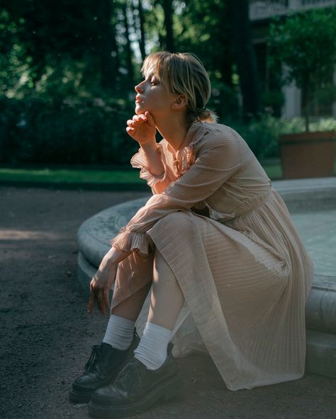 a woman sitting on the ground in a dress photo – Free Санкт-петербург Image on Unsplash Sitting Down In Dress Reference, Long Skirt Reference Sitting, Long Dress Sitting Pose, Sitting In Long Dress Reference, Sitting Down In A Dress, Sitting On The Ground Pose Reference, Sitting Woman Reference, Long Skirt Sitting Pose, Woman Sitting In Dress