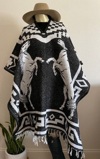 "Super Cozy Mexican poncho ! Horses, cowboy cape style ! The inside is fleece, the outside is mix of cotton - polyester and acrylic. Super cozy , thick , like a blanket. For super cold weather. ONE SIZE - PLUS SIZE - UNISEX. Length: 38\" ( measuring from shoulder to hem ) Width: 43\" OPEN IN BOTH SIDES ( no sleeves ) NO RETURNS OR EXCHANGES ( no smaller or larger size to exchange )" Wild West Poncho, Mexican Cowboy Outfit, Cowboy Poncho, Mexican Clothing Style, Mexican Cowboy, Cowboy Clothes, Goth Cowboy, Cowboy Fashion, Cowboy Outfit