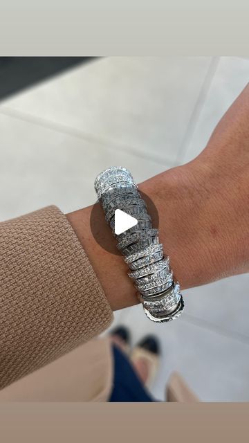 Charles Krypell on Instagram: "The Opera House Collection by Charles Krypell has been a hallmark of the brand for over 30 years. Featuring meticulously cut diamond baguettes that fan out between exquisitely crafted platinum walls, each piece boasts a striking, stepped design that allows light to dance and reflect across the facets of every diamond and the flawlessly polished metal holding them in place.

Pictured above is the latest reimagining of our iconic jumbo Platinum and Diamond Opera House bracelet. With thousands of hours of craftsmanship and hundreds of individually cut diamonds, this breathtaking piece is destined to become a treasured family heirloom and the dazzling centerpiece of any ensemble.

Available now in-store or at your preferred Charles Krypell retailer." Diamond Bangles Designer Latest, House Bracelet, Diamond Bangles, Steps Design, The Opera, Family Heirloom, Baguette Diamond, 30 Years, Opera House