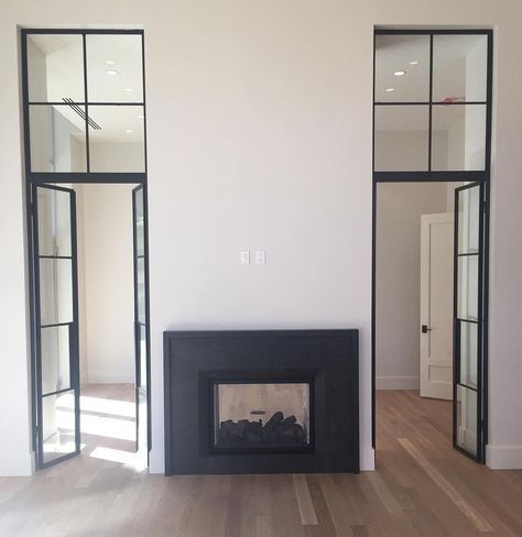 Fireplace Between Two Patio Doors, Double Faced Fireplace, Dual Side Fireplace, Fireplace Between Two French Doors, Fireplace With Doorway On One Side, Double Sided Fireplace Bathroom, Double Sided Fireplace Living Room Ideas, Fireplace With Door On One Side, Door Beside Fireplace