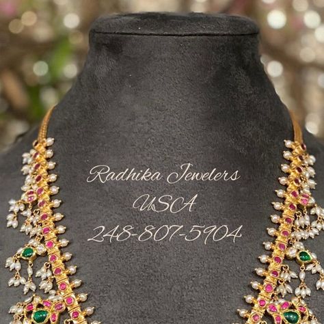 Radhika Jewelers USA on Instagram: "Beautiful 22 carat Hallmarked Guttapoosalu Necklace studded with rubies, emeralds, pearls and uncuts. For full product details pls what’s app at below numbers 👇 248-807-5904 Or 248-500-8070 Follow us on Facebook at https://www.facebook.com/radhikajewelers/ Follow us on Instagram at @radhikajewelersusa #uncutjeweley#bridal#southindian#jewlery#necklace#bridaljewellery#designer#hyderabadjewelry#bridesoftoday#telugubrides#pellikururu#pellinagalu#southindian# Radhika Jewellers Usa, Jewlery Necklace, Follow Us On Instagram, Follow Us, Hallmark, Ruby, Emerald, Instagram