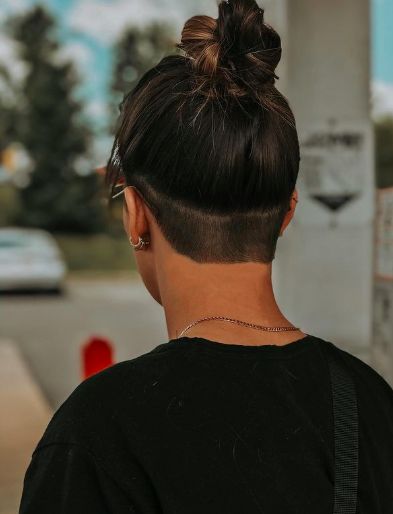 Undercut Designs: Shaved Nape. A subtle buzzed-nape undercut. Click through for 45 undercut design ideas. #undercutdesigns #undercuts #hairideas #haircutideas IG: @brenn_xx Tomboy Undercut Long Hair, Buzzed Back Hair Undercut, Shaved Hair Underneath, Shaved Undercut Hairstyles, Shaved Head Women Undercut, Undercut Shapes, Female Undercut Long Hair Design, Lower Undercut, Undercut For Round Face Woman