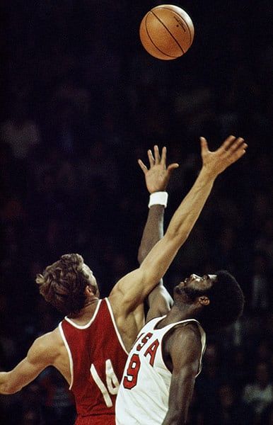 The 1972 men's Olympic basketball final in Munich was a sporting battle between the Cold War superpowers. The USA were unbeaten in the Olympics and were outright favourites going into the match. When Dwight Jones and Alexsander Belov tipped off (pictured), few could have imagined the drama that would ensue at the Rudii Sedlmayer Halle Photograph: Tony Duffy/Getty Images Basketball Slogans, Sports Slogans, Basketball Scoreboard, Olympic Basketball, Basketball Tricks, Fantasy Basketball, Basketball Tips, Sports Aesthetic, The Olympics