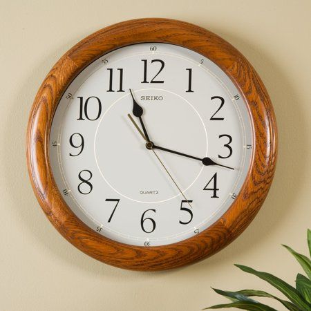 Our #1 Wall Clock! This dark brown solid oak clock with Arabic Numbers and quiet sweep is 13 inches round and brings warmth and sophistication to the home as well as office space. Classically designed, it features a brown case with a wooden grain finish, glass cover, and a quiet sweep second hand. Size: 13 inch. Best Wall Clocks, Arabic Numbers, 3d Wall Clock, Wall Watch, White Clocks, Retro Wall Clock, Analog Clock, Clock Shop, Glass Cover