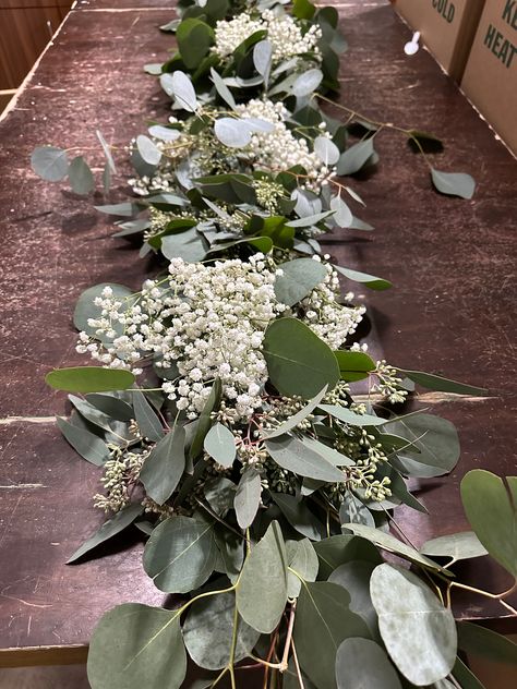 Silver Dollar - Seeded Euc - Babysbreath Garland All orders can be customized. We ship FedEx to ensure the freshest garland on Etsy. (delivery available Tuesday-Friday) Bulk discount available and customization available. We stock all California grown greens.  Please message us if you need a bulk garland custom order. If needed for a specific event/wedding, please note your desired arrival date in the special instruction box during check out. We suggest receiving your garland 2-3 days before use. Silver Dollar Eucalyptus Garland, White Roses And Eucalyptus Centerpieces Wedding, Wedding Floral Eucalyptus, Wedding Flowers For The Aisle, Wedding Table Centerpieces Candlesticks, Head Table Greenery Garland, Moss Terrarium Centerpiece Wedding, Eucalyptus Wedding Table Centerpieces, Greenery And Babysbreath Wedding