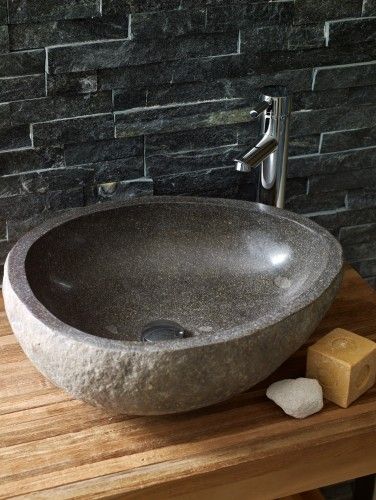 Lavastone Pebble Basin from Mandarin Stone. These unique basins are carved from Basalt boulders found in the rivers of Indonesia. No two basins are alike and they vary in both size & shape, serving to create a singular look to your bathroom. http://www.mandarinstone.com/products/bathware/lavastone_pebble_basin_limestone# حوض الحمام, Stone Bathroom Sink, Mandarin Stone, Bad Inspiration, Downstairs Toilet, Stone Bathroom, Stone Bowl, Stone Basin, Stone Sink