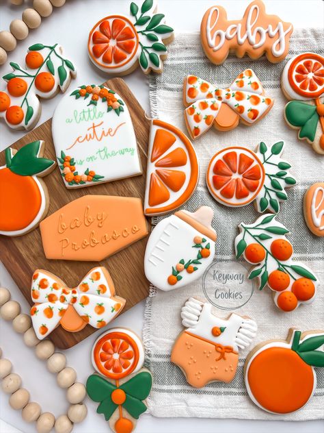 Indulge in the sweetest anticipation with these adorably decorated sugar cookies for a baby shower! These little works of art are crafted with love, featuring charming designs that capture the joy and wonder of welcoming a precious baby into the world. Little Cutie On The Way, Cutie On The Way, Cutie Is On The Way, Orange Baby Shower, Birthday Cookie, Royal Baby Showers, Shower Cookies, Sugar Cookie Designs, Decorated Sugar Cookies