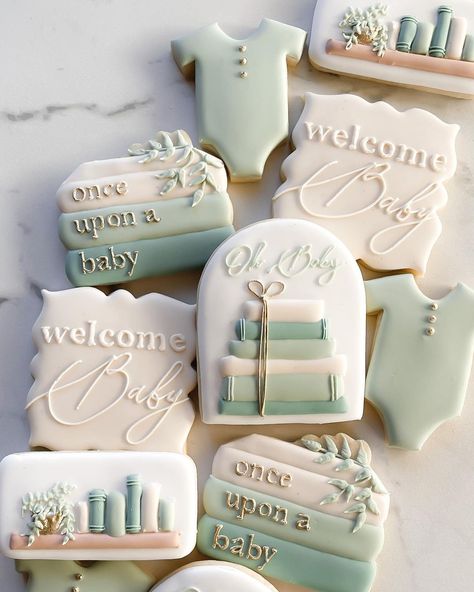 Once Upon A Time Decorated Cookies, Tiny Sprout Baby Shower Theme, The Next Chapter Baby Shower Theme, Book Shaped Cookies, Baby Book Themed Shower Ideas, Storybook Baby Shower Cookies, Baby Shower Cookie Display Ideas, Showered With Love Baby Shower Theme, Book Baby Shower Cookies