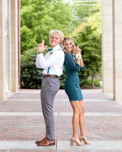 Navy Blue And Black Hoco Couple, Prom Photo Ideas Couple Funny, Teal Homecoming Couple, Prom Picture Poses Funny, Prom Pictures Couples Funny, Green Hoco Dress Couple, Baseball Hoco Pictures, Hoco Poses Couple Funny, Funny Hoco Poses With Date