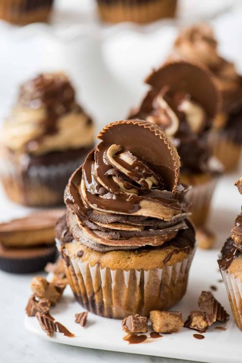 Chocolate peanut butter swirled cake and chocolate peanut butter swirled frosting makes these the ULTIMATE Reese’s Cupcakes! Plus there’s chopped peanut butter cups in the cake batter! We know you’ll fall in love with this reese’s cupcake with reese’s frosting. #reesescupcakes #chocolatepeanutbutter #peanutbuttercupcakes Swirled Frosting, Reese's Cupcakes, Gourmet Cupcakes, Cupcake Flavors, Baking Cupcakes, Bakery Recipes, Dessert Cupcakes, Fun Baking Recipes, Yummy Cupcakes