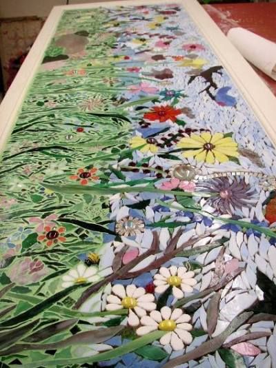 A myriad of colors show in the intricacies of the design Tile Planter, Mosaic Fireplace, Winter Projects, Mosaic Garden Art, Floral Mosaic, Mosaic Art Projects, Mosaic Stained, Mosaic Tile Art, Mosaic Murals