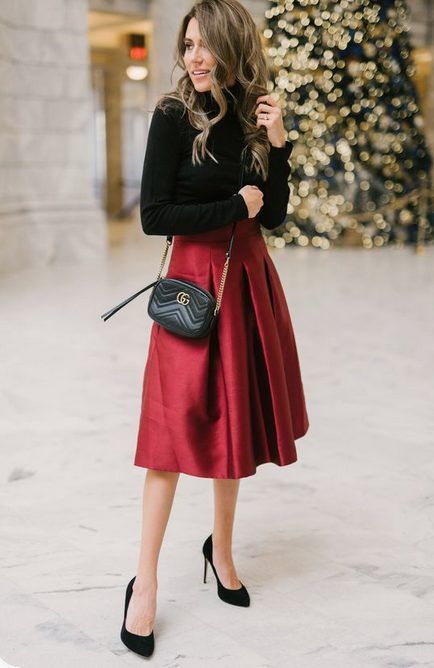 Midi Red Satin Skirt with Long-Sleeved Black Shirt | Get classy and formal holiday party dresses, chic Christmas skirts and Xmas holiday pants with sequin sparkle. Perfect for winter and the 2020 holiday season. #christmaspartyoutfits #christmasoutfitideas #classychristmasoutfits #holidayoutfits Classy Christmas Party, Christmas Dinner Outfit, Holiday Party Outfit Work, Christmas Outfit Ideas For Women Classy, Cozy Christmas Outfit, Trendy Christmas Outfits, Lunch Outfit, Cute Christmas Outfits, Christmas Day Outfit